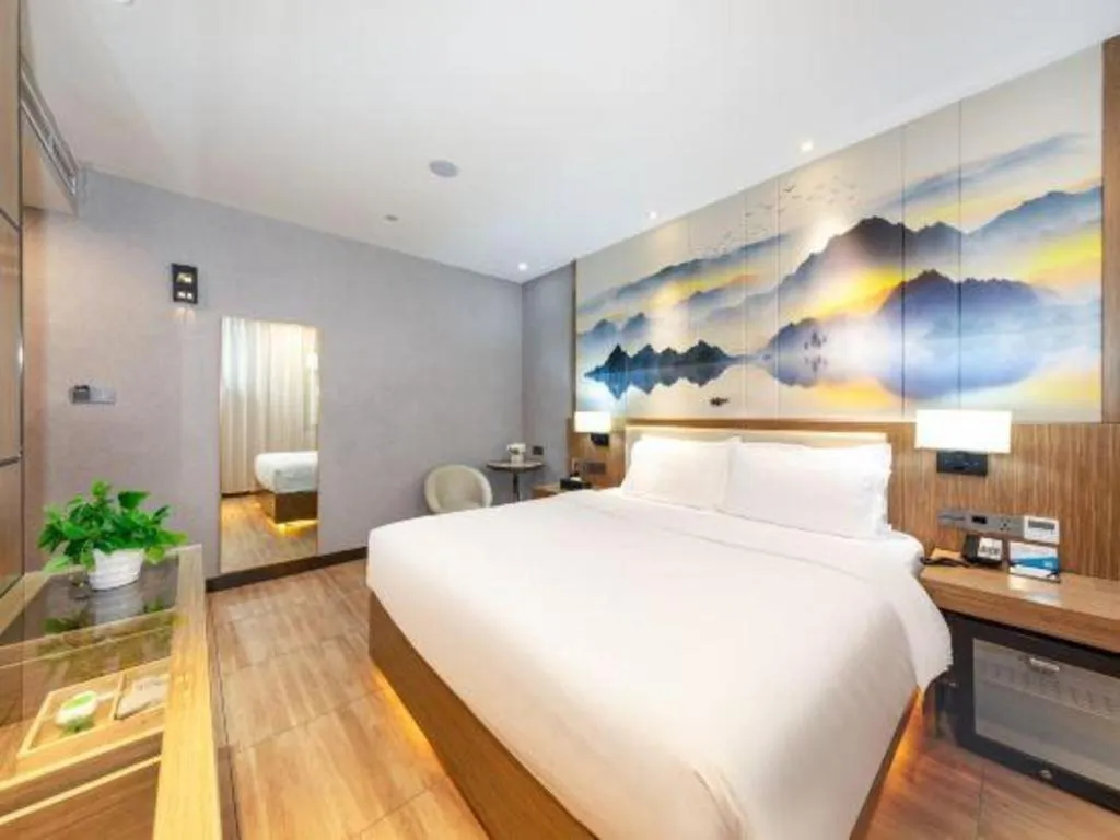 Bed in ZMAX Hotel Beijing Tongzhou Universal Tourist Resort Linheli Metro Station