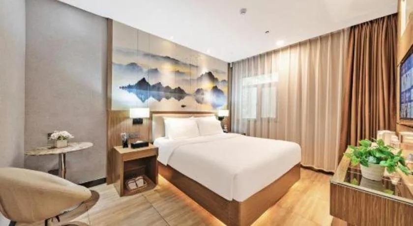 Bed in ZMAX Hotel Beijing Tongzhou Universal Tourist Resort Linheli Metro Station