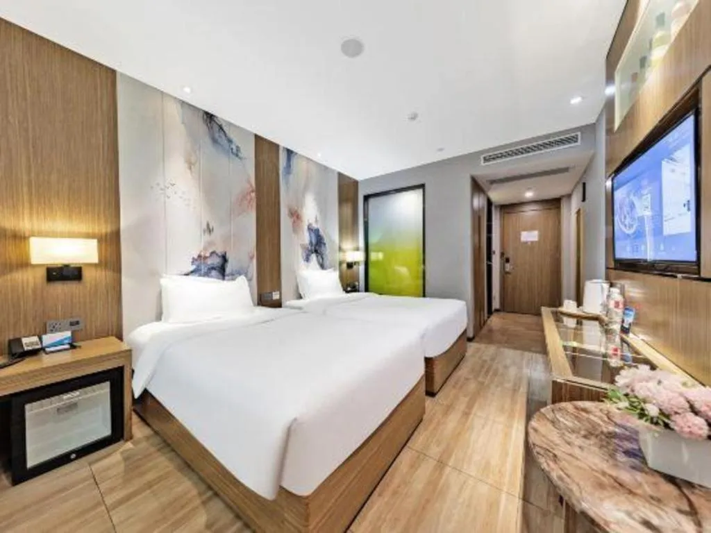 Bed in ZMAX Hotel Beijing Tongzhou Universal Tourist Resort Linheli Metro Station