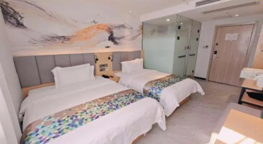 Bed in ZMAX Hotel Beijing Tongzhou Universal Tourist Resort Linheli Metro Station