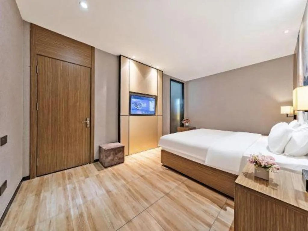 Bed in ZMAX Hotel Beijing Tongzhou Universal Tourist Resort Linheli Metro Station