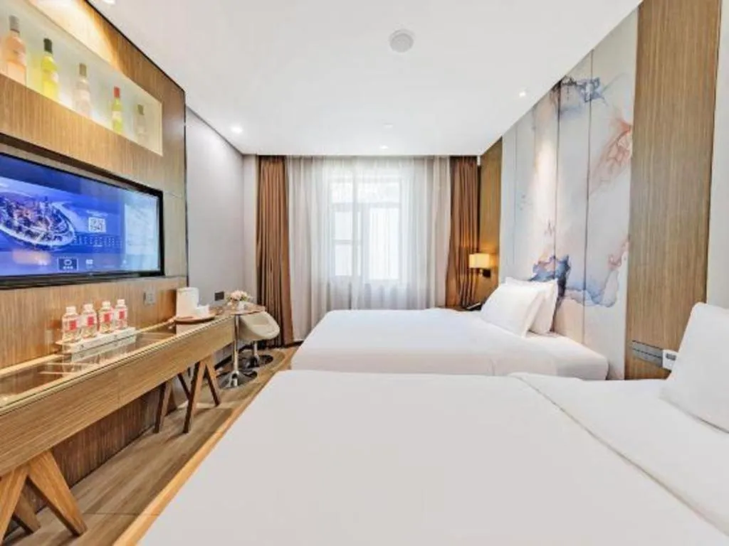 Bed in ZMAX Hotel Beijing Tongzhou Universal Tourist Resort Linheli Metro Station