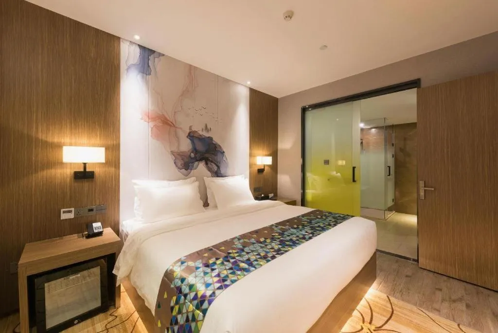 Bed in ZMAX Hotel Beijing Tongzhou Universal Tourist Resort Linheli Metro Station