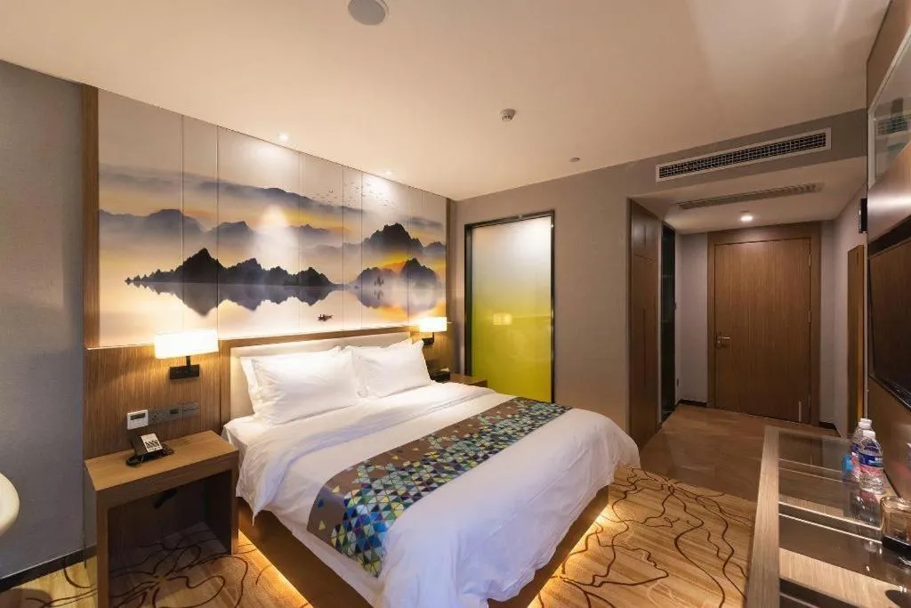 Bed in ZMAX Hotel Beijing Tongzhou Universal Tourist Resort Linheli Metro Station