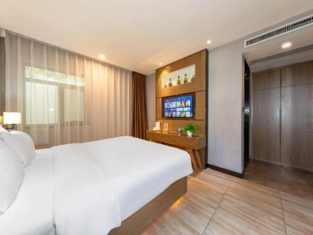 Bed in ZMAX Hotel Beijing Tongzhou Universal Tourist Resort Linheli Metro Station