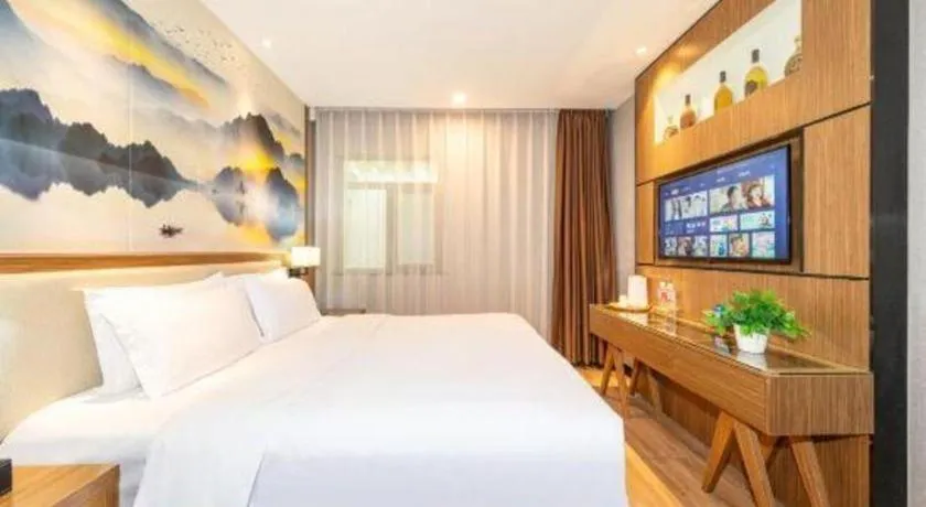 Bed in ZMAX Hotel Beijing Tongzhou Universal Tourist Resort Linheli Metro Station