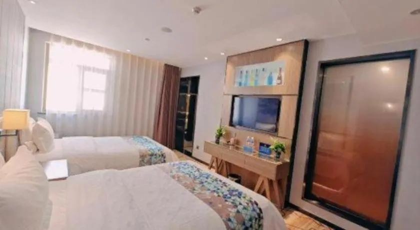 Bed in ZMAX Hotel Beijing Tongzhou Universal Tourist Resort Linheli Metro Station