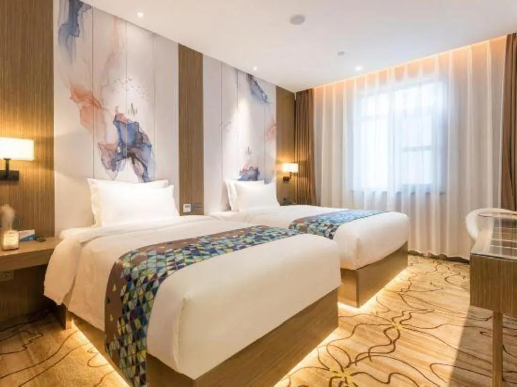 Bed in ZMAX Hotel Beijing Tongzhou Universal Tourist Resort Linheli Metro Station
