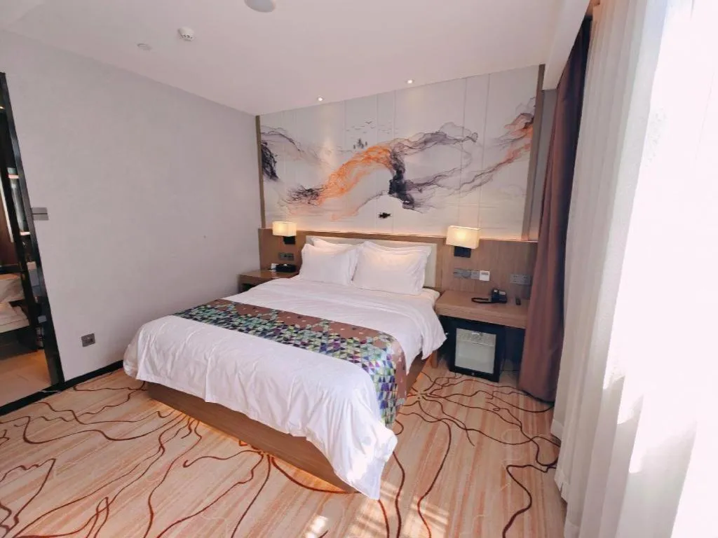 Bed in ZMAX Hotel Beijing Tongzhou Universal Tourist Resort Linheli Metro Station