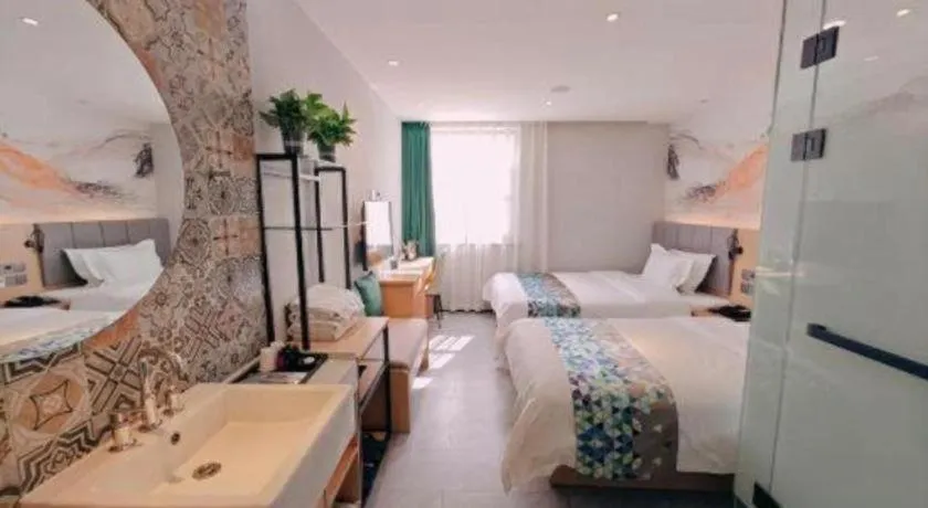 Bed in ZMAX Hotel Beijing Tongzhou Universal Tourist Resort Linheli Metro Station