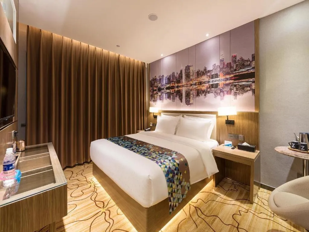 Bed in ZMAX Hotel Beijing Tongzhou Universal Tourist Resort Linheli Metro Station