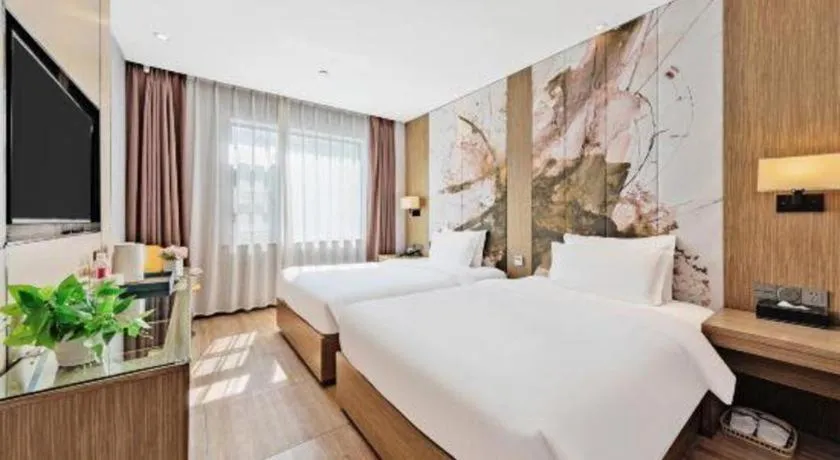 Bed in ZMAX Hotel Beijing Tongzhou Universal Tourist Resort Linheli Metro Station
