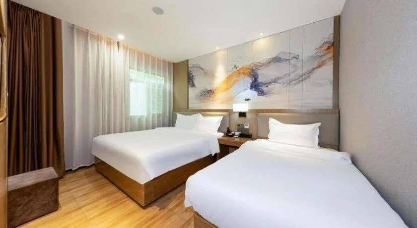Bed in ZMAX Hotel Beijing Tongzhou Universal Tourist Resort Linheli Metro Station