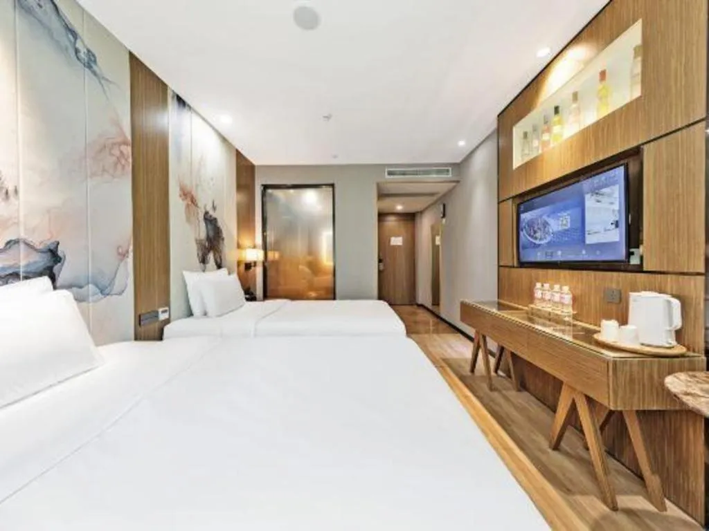 Bed in ZMAX Hotel Beijing Tongzhou Universal Tourist Resort Linheli Metro Station
