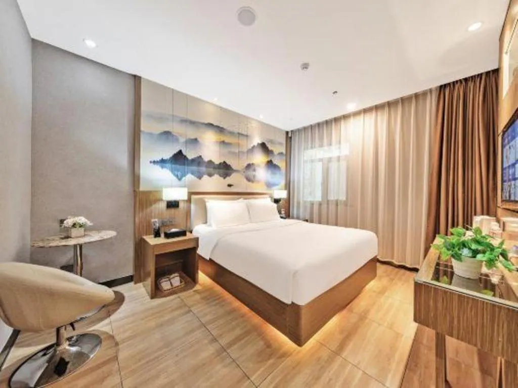 Bed in ZMAX Hotel Beijing Tongzhou Universal Tourist Resort Linheli Metro Station