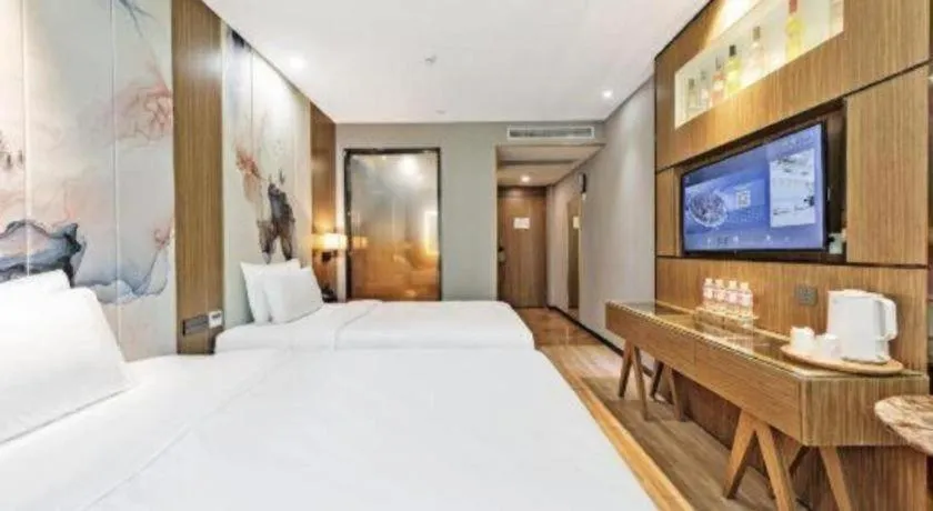 Bed in ZMAX Hotel Beijing Tongzhou Universal Tourist Resort Linheli Metro Station