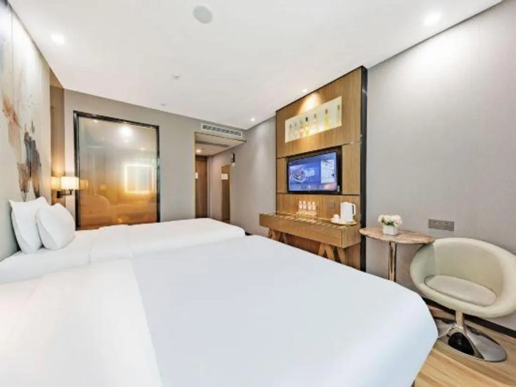 Bed in ZMAX Hotel Beijing Tongzhou Universal Tourist Resort Linheli Metro Station