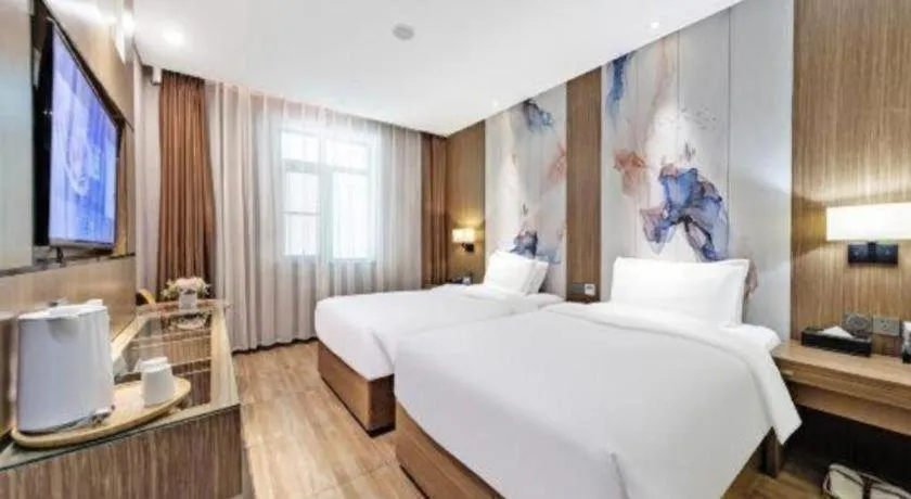 Bed in ZMAX Hotel Beijing Tongzhou Universal Tourist Resort Linheli Metro Station