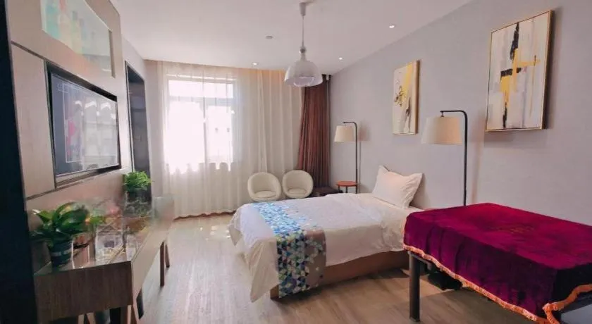 Bed in ZMAX Hotel Beijing Tongzhou Universal Tourist Resort Linheli Metro Station