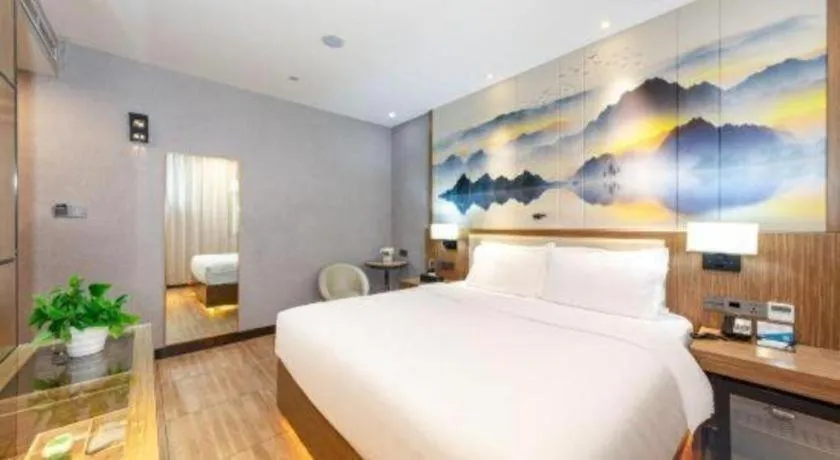 Bed in ZMAX Hotel Beijing Tongzhou Universal Tourist Resort Linheli Metro Station