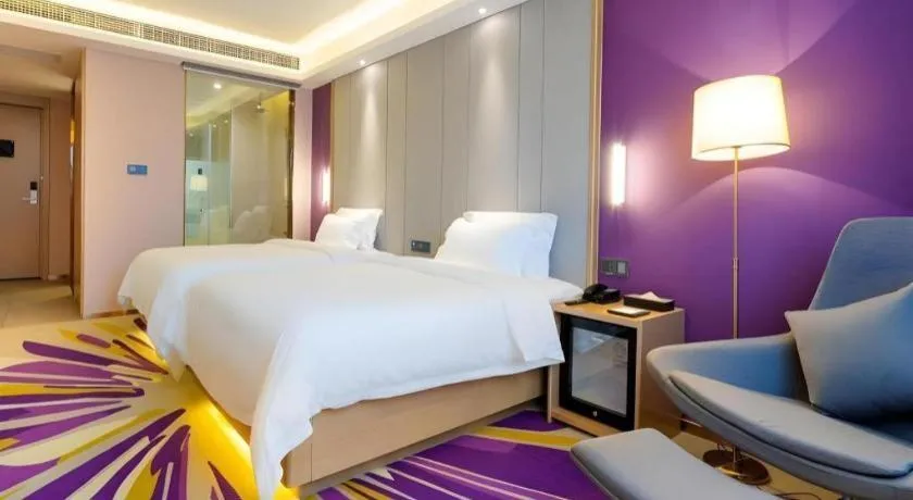 Bed in Lavande Hotel Lu County High-Speed Railway Station Wanhu Daduhui