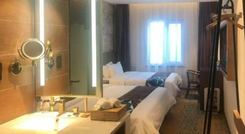 Bed in James Joyce Coffetel Beijing Pinggu Hospital Century Square