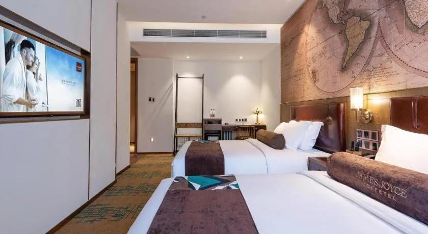 Bed in James Joyce Coffetel Beijing Pinggu Hospital Century Square