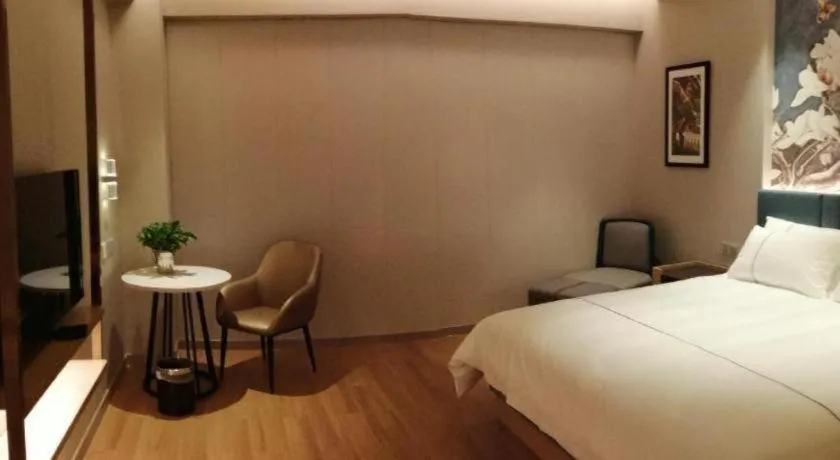 Bed in Magnotel Huludao Xingcheng Central Square Wenquan Street