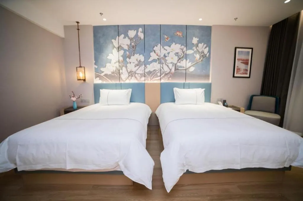 Bed in Magnotel Huludao Xingcheng Central Square Wenquan Street