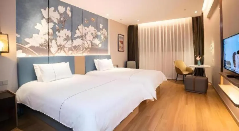 Bed in Magnotel Huludao Xingcheng Central Square Wenquan Street