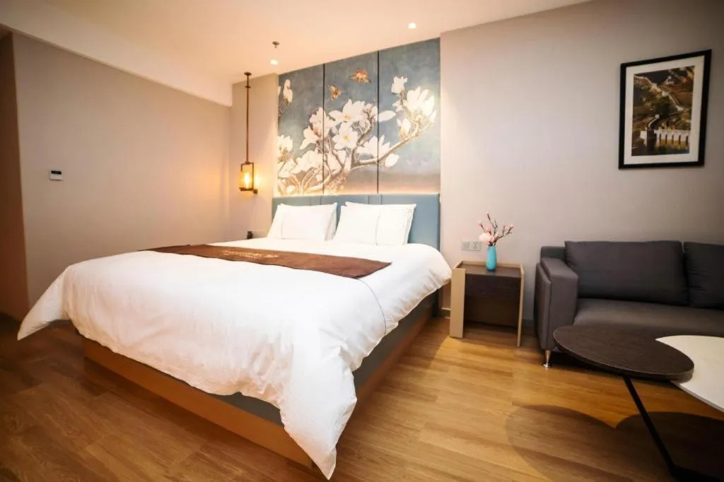 Bed in Magnotel Huludao Xingcheng Central Square Wenquan Street