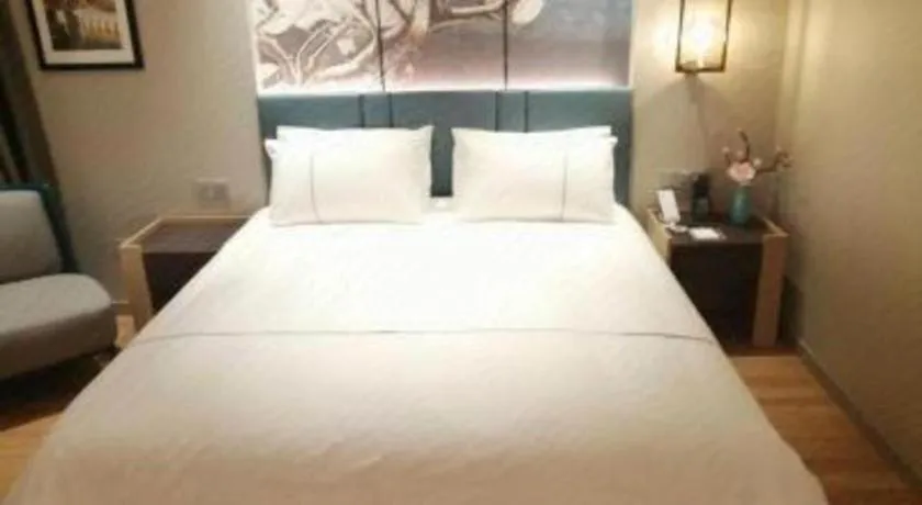 Bed in Magnotel Huludao Xingcheng Central Square Wenquan Street