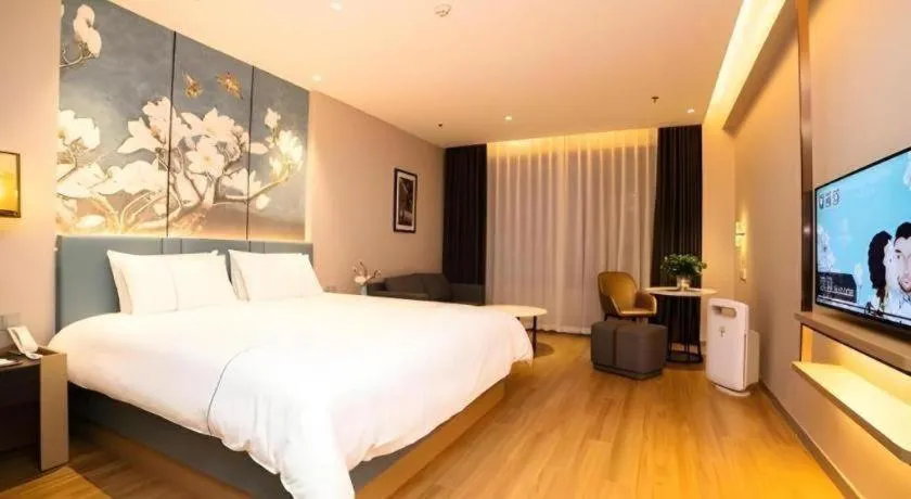 Bed in Magnotel Huludao Xingcheng Central Square Wenquan Street