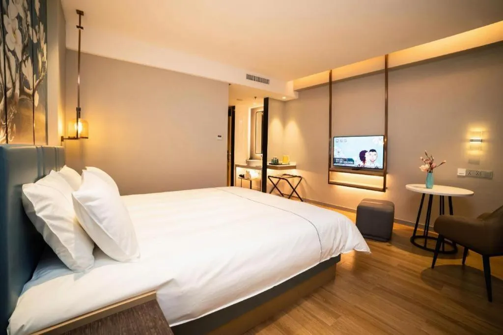 Bed in Magnotel Huludao Xingcheng Central Square Wenquan Street