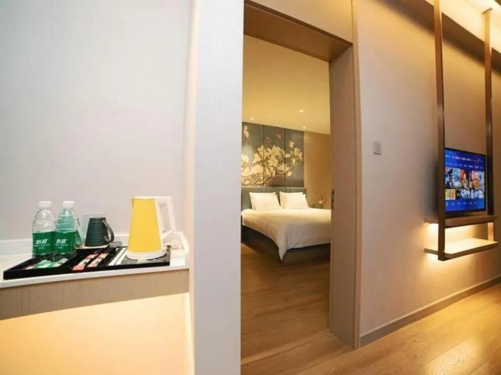 Bed in Magnotel Huludao Xingcheng Central Square Wenquan Street