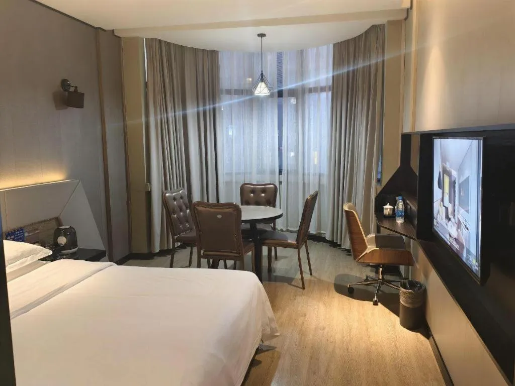 Bed in IU Hotel Xinyu Fenyi Mall