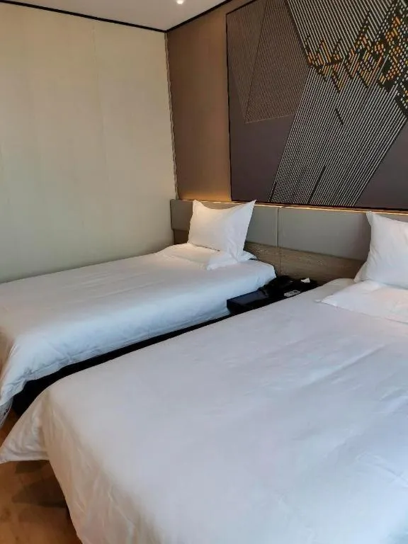 Bed in IU Hotel Xinyu Fenyi Mall