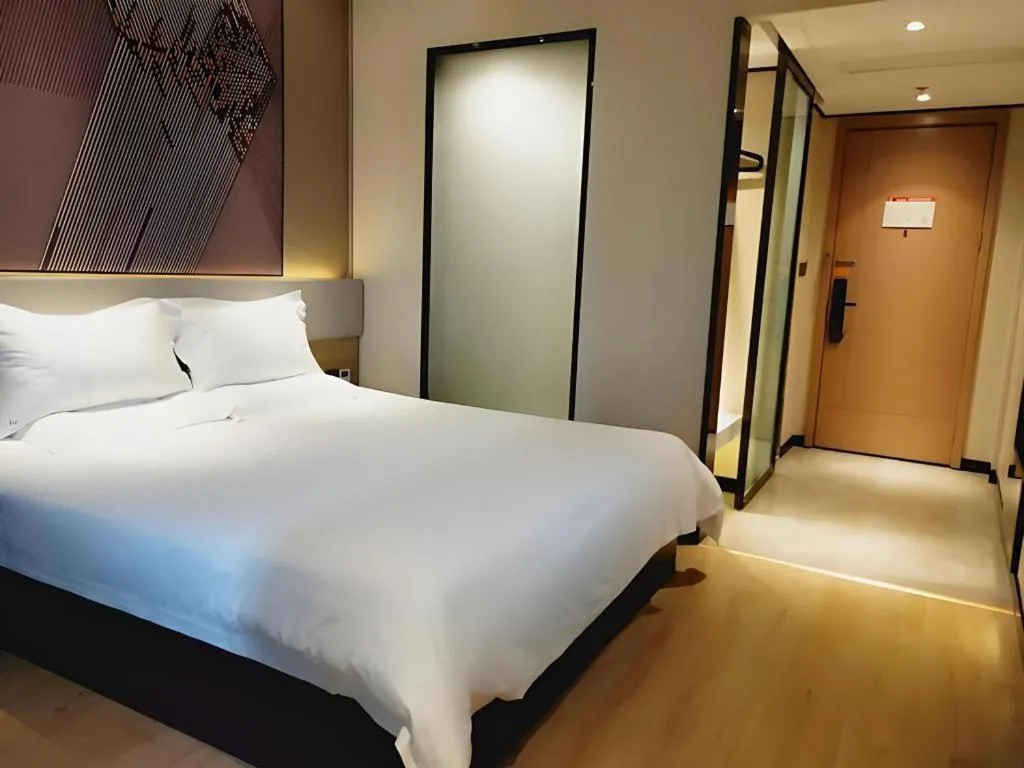 Bed in IU Hotel Xinyu Fenyi Mall