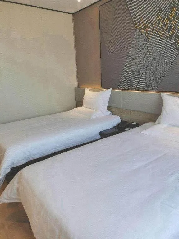 Bed in IU Hotel Xinyu Fenyi Mall