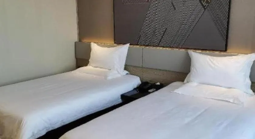 Bed in IU Hotel Xinyu Fenyi Mall