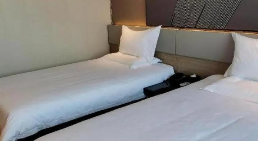 Bed in IU Hotel Xinyu Fenyi Mall