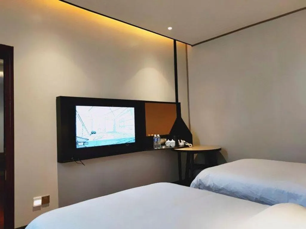 Bed in IU Hotel Xinyu Fenyi Mall