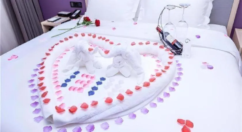 Bed in Lavande Hotel Guangzhou Zengchen Xintang Light Railway Station