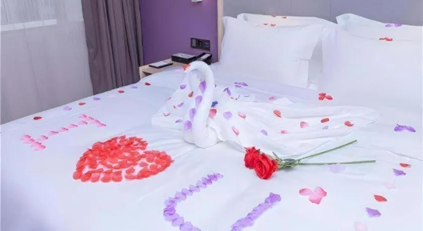 Bed in Lavande Hotel Guangzhou Zengchen Xintang Light Railway Station