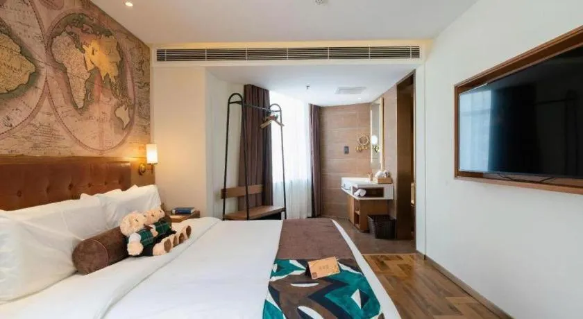 Bed in James Joyce Coffetel Shenyang North Railway Station Qishan Road Metro Station