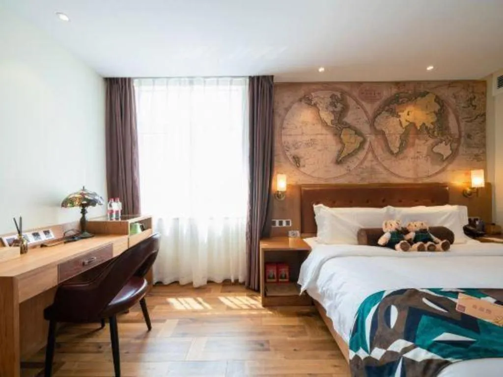 Bed in James Joyce Coffetel Shenyang North Railway Station Qishan Road Metro Station