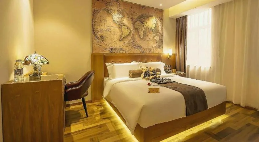 Bed in James Joyce Coffetel Shenyang North Railway Station Qishan Road Metro Station