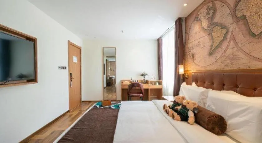 Bed in James Joyce Coffetel Shenyang North Railway Station Qishan Road Metro Station