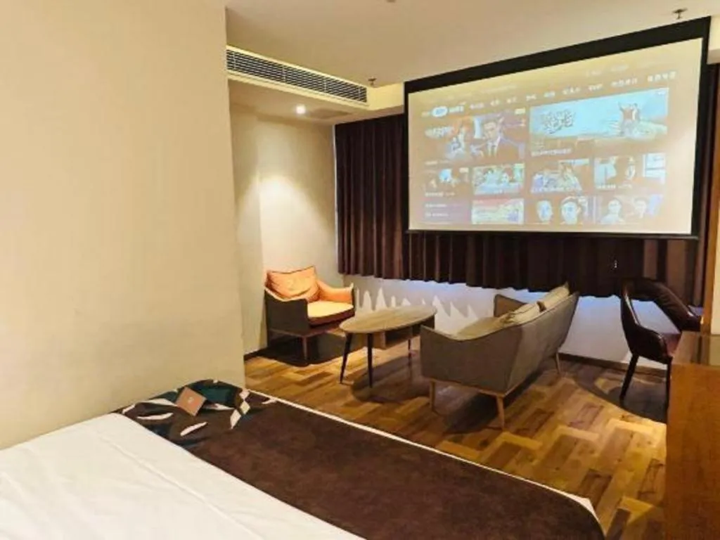 Bed in James Joyce Coffetel Shenyang North Railway Station Qishan Road Metro Station