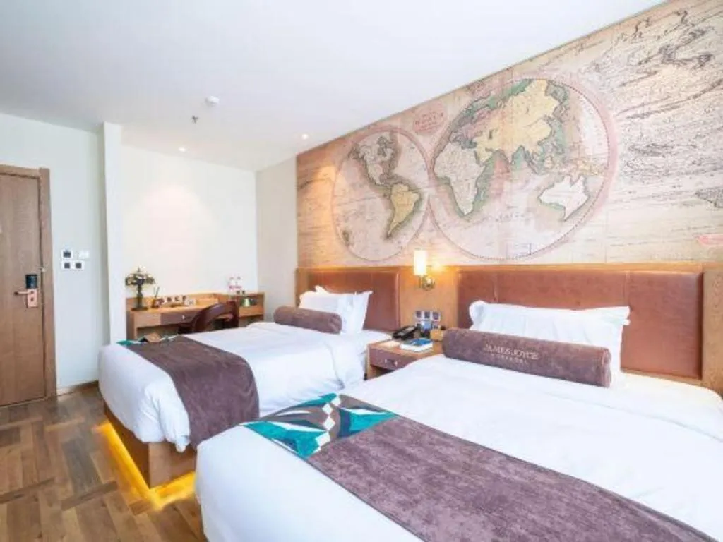 Bed in James Joyce Coffetel Shenyang North Railway Station Qishan Road Metro Station